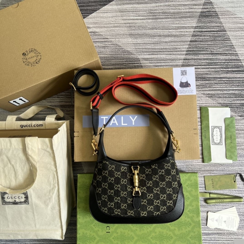 G*u*i top handle bags